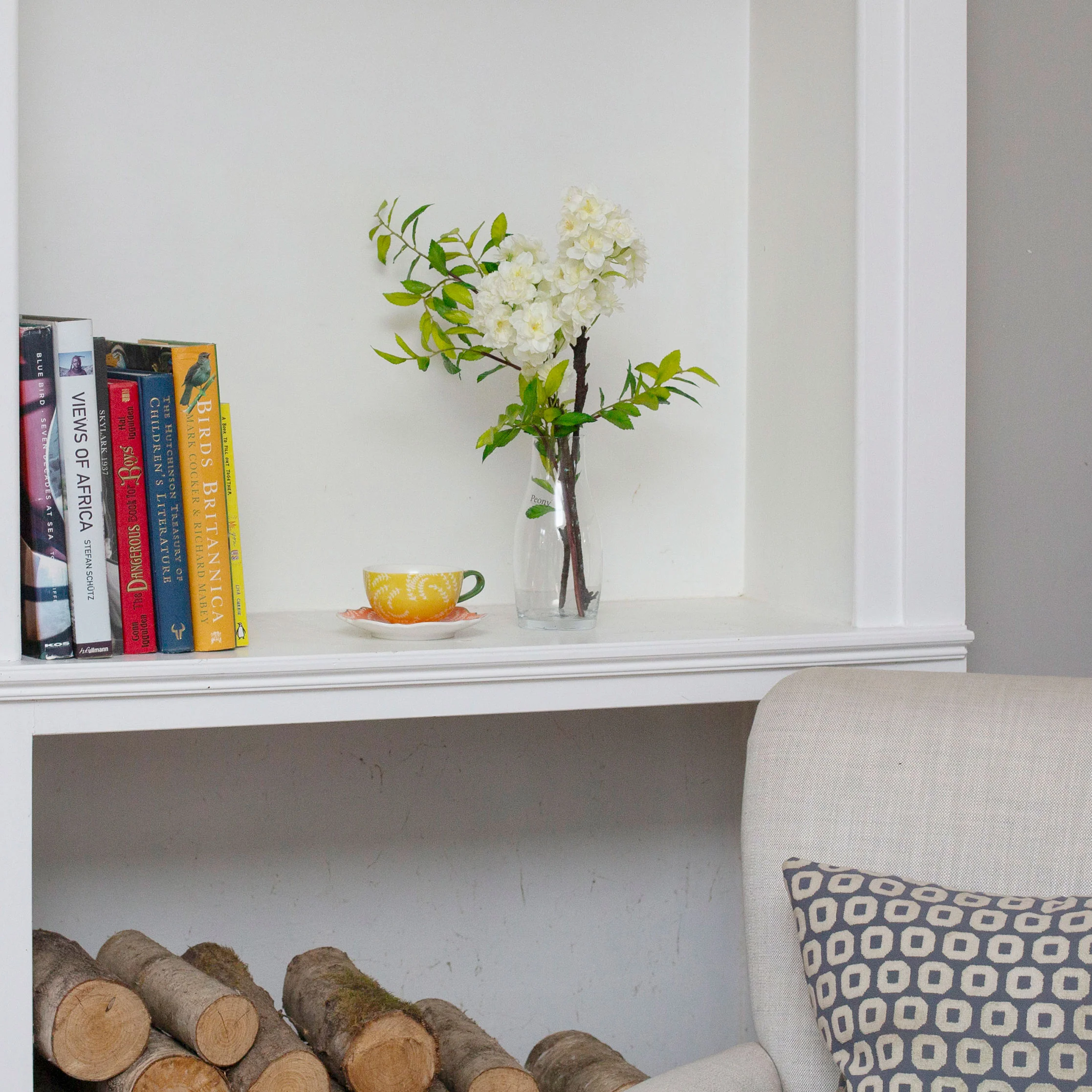 Artificial Blossom Stems in Glass Milk Bottle Vase - Image 4